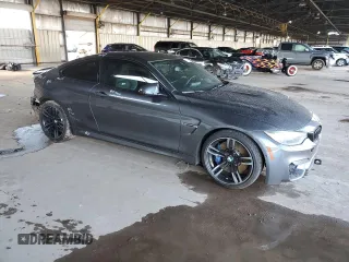2015 BMW M4 with VIN WBS3R9C54FK335119, listed as a Copart auction lot 42120434 with 57,384 mi miles. Bid and sale history available at carsss.com. Image 4.