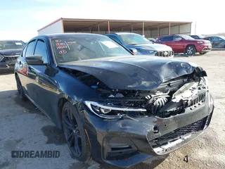 2021 BMW 3 Series 330i z VIN 3MW5R1J05M8B84800, wystawiony jako IAAI lot #41818906 z przebiegiem Nie podano mil oraz . Historia ofert i sprzedaży dostępna na DreamBid. Obrazek 1.