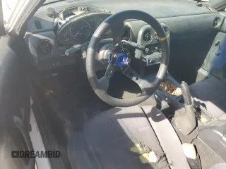 1991 Mazda MX-5 Miata Special Edition z VIN JM1NA3515M0231262, wystawiony jako Copart lot #57221675 z przebiegiem 241 670 mil mil oraz Szkoda całkowita • Salvage title. Historia ofert i sprzedaży dostępna na DreamBid. Obrazek 8.