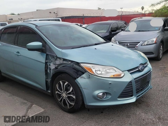 2012 Ford Focus SE с VIN 1FAHP3F22CL279808, выставлен на аукционе Copart как лот 59241215 с пробегом 138 973 миль миль и Чистый • Clean title. История ставок и продаж доступна на DreamBid. Изображение 1.