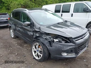 2015 Ford Escape Titanium with VIN 1FMCU9J90FUA72039, listed as a IAAI auction lot 42347537 with 147,810 mi miles and . Bid and sale history available at DreamBid. Image 1.