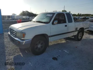 1997 Toyota T100 DX z VIN JT4TN12DXV0033096, wystawiony jako Copart lot #54471655 z przebiegiem 188 886 mil mil oraz Szkody całkowita. Historia ofert i sprzedaży dostępna na DreamBid. Obrazek 1.