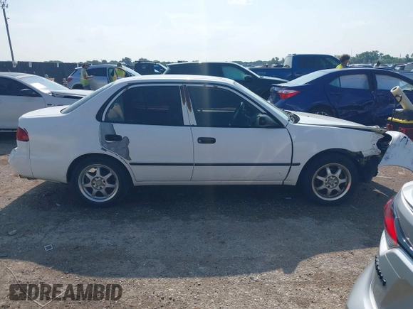 1998 Toyota Corolla VE with VIN 1NXBR12E5WZ025437, listed as a IAAI auction lot 42401543 with 237,273 mi miles and . Bid and sale history available at DreamBid. Image 13.
