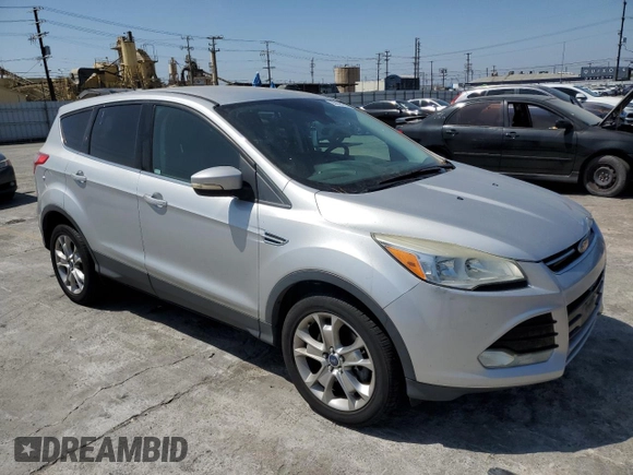 2013 Ford Escape SEL with VIN 1FMCU9H98DUB01757, listed as a Copart auction lot 63626185 with 189,695 mi miles and Clean title. Bid and sale history available at DreamBid. Image 4.
