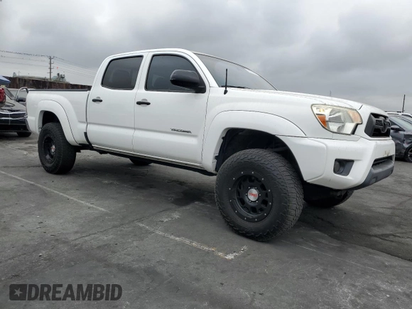 2014 Toyota Tacoma PreRunner with VIN 3TMKU4HN9EM040957, listed as a Copart auction lot 76579404 with 91,222 mi miles and Salvage title. Bid and sale history available at DreamBid. Image 4.
