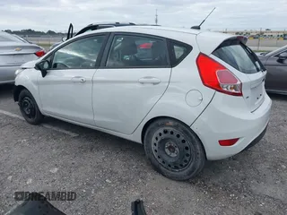 2019 Ford Fiesta SE z VIN 3FADP4EJ5KM132862, wystawiony jako IAAI lot #40893430 z przebiegiem 91 011 mil mil oraz . Historia ofert i sprzedaży dostępna na DreamBid. Obrazek 3.