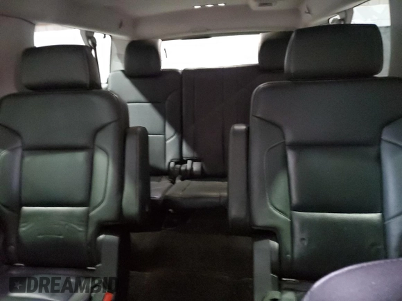 2015 Chevrolet Suburban LTZ with VIN 1GNSKKKC7FR299567, listed as a Copart auction lot 52944035 with 147,964 mi miles and Salvage Title. Bid and sale history available at DreamBid. Image 10.