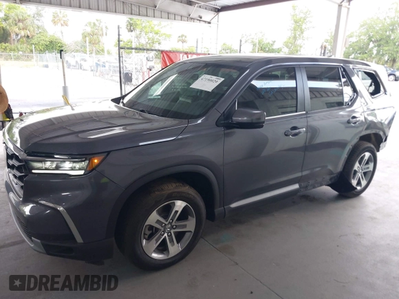 2025 Honda Pilot EX-L z VIN 5FNYG2H40SB019525, wystawiony jako IAAI lot #42190029 z przebiegiem 10 794 mil mil oraz . Historia ofert i sprzedaży dostępna na DreamBid. Obrazek 15.