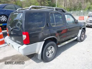 2000 Nissan Xterra XE with VIN 5N1ED28Y9YC604703, listed as a IAAI auction lot 42095801 with 250,603 mi miles. Bid and sale history available at carsss.com. Image 4.