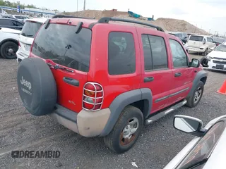 2003 Jeep Liberty Sport with VIN 1J4GL48K23W660989, listed as a IAAI auction lot 40370765 with 166,297 mi miles. Bid and sale history available at carsss.com. Image 4.