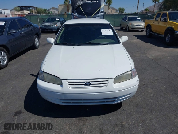 1999 Toyota Camry LE z VIN 4T1BG22K0XU904122, wystawiony jako IAAI lot #42305293 z przebiegiem 243 182 mil mil oraz . Historia ofert i sprzedaży dostępna na DreamBid. Obrazek 6.