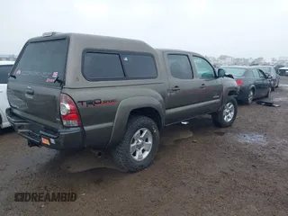 2014 Toyota Tacoma with VIN 5TFLU4EN6EX104410, listed as a IAAI auction lot 41925708 with 189,375 mi miles. Bid and sale history available at carsss.com. Image 4.