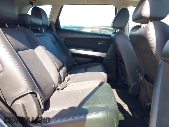 2014 Mazda CX-9 Grand Touring z VIN JM3TB3DV9E0437380, wystawiony jako IAAI lot #42298066 z przebiegiem 169 644 mil mil oraz . Historia ofert i sprzedaży dostępna na DreamBid. Obrazek 8.