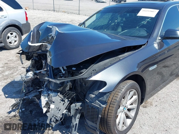 2014 BMW 5 Series 535i with VIN WBA5B1C54ED477525, listed as a IAAI auction lot 41692887 with 122,288 mi miles. Bid and sale history available at carsss.com. Image 17.