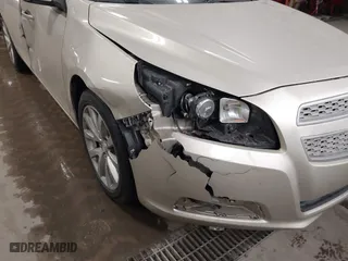 2013 Chevrolet Malibu LTZ with VIN 1G11H5SAXDF236151, listed as a IAAI auction lot 41720812 with 181,159 mi miles. Bid and sale history available at carsss.com. Image 6.