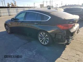 2016 BMW 5 Series GT 535i with VIN WBA5M2C58GG499092, listed as a Copart auction lot 77889944 with 80,329 mi miles and Salvage Title. Bid and sale history available at carsss.com. Image 2.