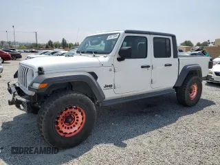 2020 Jeep Gladiator Sport S z VIN 1C6HJTAG8LL151272, wystawiony jako Copart lot #55477595 z przebiegiem 92 339 mil mil oraz Szkoda całkowita • Salvage title. Historia ofert i sprzedaży dostępna na DreamBid. Obrazek 1.