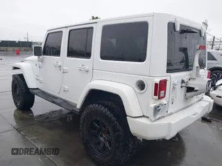 2016 Jeep Wrangler Unlimited Sahara with VIN 1C4HJWEG8GL240950, listed as a IAAI auction lot 41443059 with Not provided miles and . Bid and sale history available at DreamBid. Image 3.