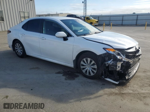 2022 Toyota Camry Hybrid LE with VIN 4T1C31AKXNU595736, listed as a Copart auction lot 50757815 with 44,231 mi miles and Salvage Title. Bid and sale history available at carsss.com. Image 4.