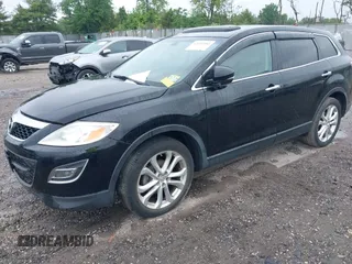 2012 Mazda CX-9 Grand Touring z VIN JM3TB3DV1C0360212, wystawiony jako IAAI lot #42232584 z przebiegiem 99 582 mil mil oraz . Historia ofert i sprzedaży dostępna na DreamBid. Obrazek 18.