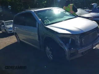 2010 Honda Odyssey EX-L z VIN 5FNRL3H78AB067806, wystawiony jako IAAI lot #42281337 z przebiegiem 152 430 mil mil oraz . Historia ofert i sprzedaży dostępna na DreamBid. Obrazek 1.