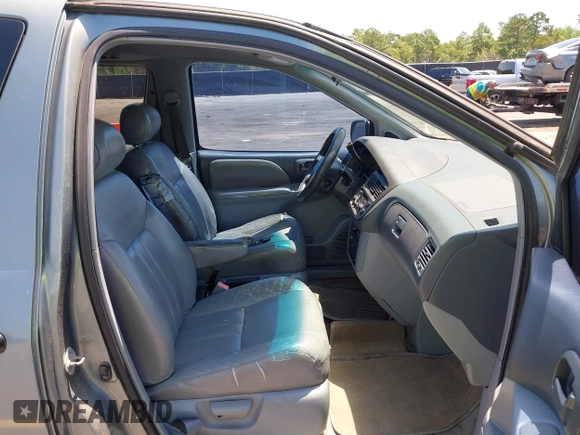 1999 Toyota Sienna LE z VIN 4T3ZF13C4XU118561, wystawiony jako IAAI lot #42536325 z przebiegiem 273 336 mil mil oraz . Historia ofert i sprzedaży dostępna na DreamBid. Obrazek 5.