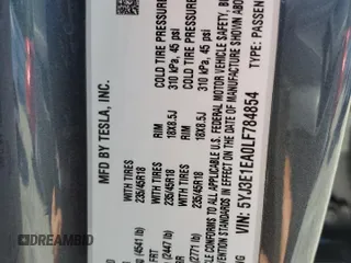 2020 Tesla Model 3 Standard Range Plus with VIN 5YJ3E1EA0LF784854, listed as a Copart auction lot 54994055 with 43,055 mi miles and Non Repairable. Bid and sale history available at DreamBid. Image 12.
