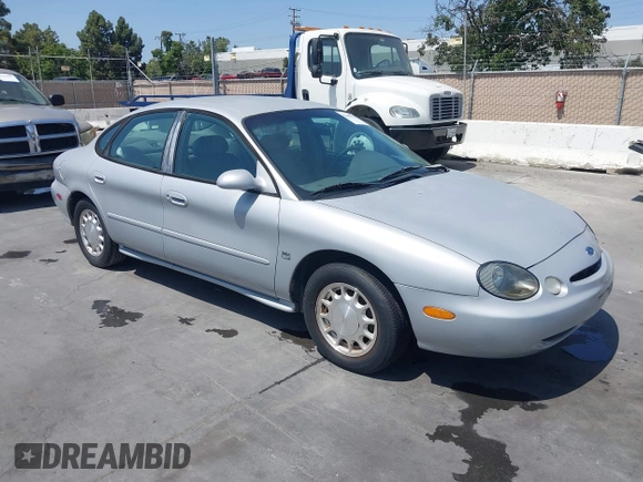 1996 Ford Taurus LX with VIN 1FALP53S5TG199843, listed as a IAAI auction lot 42430761 with 95,984 mi miles and . Bid and sale history available at DreamBid. Image 1.