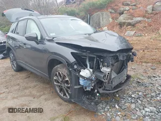 2016 Mazda CX-5 Grand Touring with VIN JM3KE4DY1G0743897, listed as a IAAI auction lot 41935796 with 167,150 mi miles and . Bid and sale history available at carsss.com. Image 1.