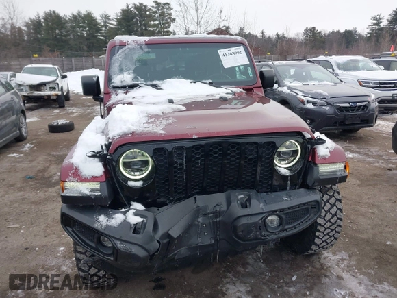 2021 Jeep Gladiator Willys with VIN 1C6HJTAG6ML571081, listed as a IAAI auction lot 41368902 with 45,077 mi miles and . Bid and sale history available at DreamBid. Image 12.
