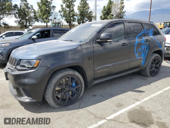 2020 Jeep Grand Cherokee Trackhawk z VIN 1C4RJFN94LC314087, wystawiony jako Copart lot #51484835 z przebiegiem 38 306 mil mil oraz Szkoda całkowita • Salvage title. Historia ofert i sprzedaży dostępna na DreamBid. Obrazek 1.