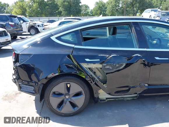 2020 Tesla Model 3 Standard Range Plus z VIN 5YJ3E1EA3LF611152, wystawiony jako IAAI lot #42256503 z przebiegiem 78 633 mil mil oraz . Historia ofert i sprzedaży dostępna na DreamBid. Obrazek 19.