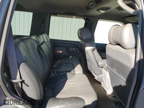 1999 GMC Denali z VIN 1GKEK13R4XR918005, wystawiony jako Copart lot #74964184 z przebiegiem 206 584 mil mil oraz Nie do naprawy. Historia ofert i sprzedaży dostępna na DreamBid. Obrazek 11.