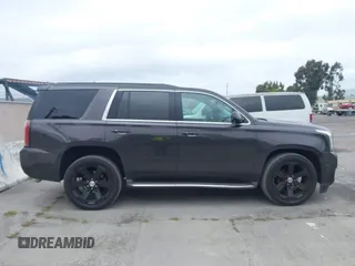 2015 GMC Yukon SLT with VIN 1GKS1BKC6FR245564, listed as a IAAI auction lot 42139295 with 149,088 mi miles. Bid and sale history available at carsss.com. Image 13.