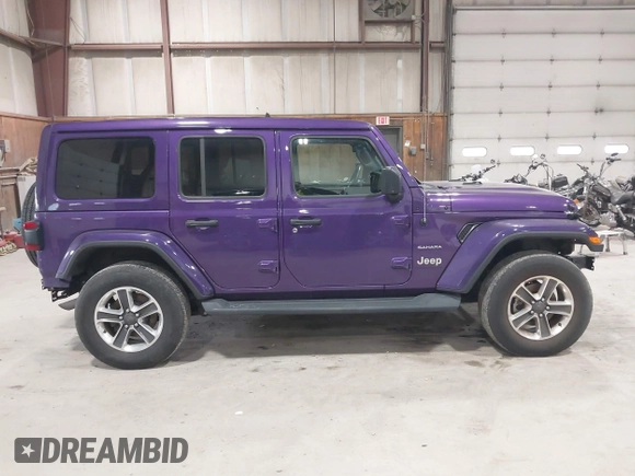 2023 Jeep Wrangler Sahara with VIN 1C4HJXEN9PW560958, listed as a IAAI auction lot 41980179 with 35,975 mi miles and . Bid and sale history available at DreamBid. Image 14.