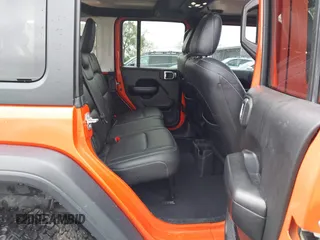 2019 Jeep Wrangler Unlimited Sport S with VIN 1C4HJXDG7KW568441, listed as a IAAI auction lot 41142271 with 73,698 mi miles and . Bid and sale history available at DreamBid. Image 8.