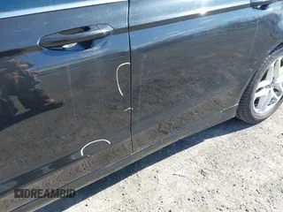 2014 Ford Fusion SE with VIN 1FA6P0HDXE5370384, listed as a IAAI auction lot 41973412 with 147,459 mi miles and . Bid and sale history available at DreamBid. Image 14.
