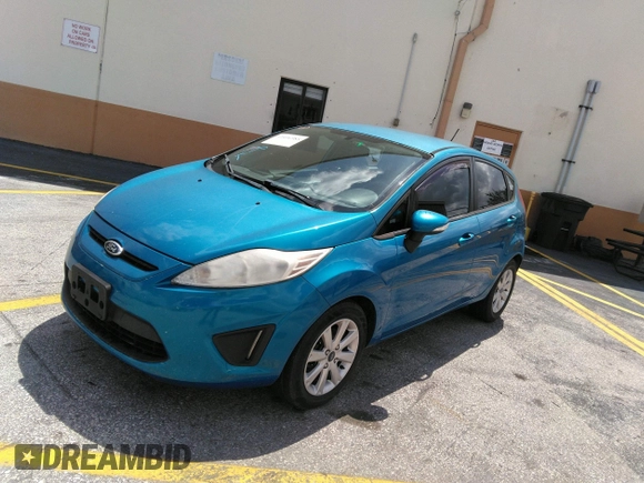 2013 Ford Fiesta SE with VIN 3FADP4EJ0DM202271, listed as a IAAI auction lot 41496985 with 174,624 mi miles. Bid and sale history available at carsss.com. Image 2.