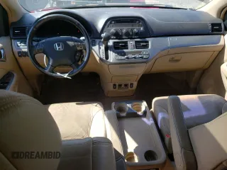 2005 Honda Odyssey Touring z VIN 5FNRL38865B002984, wystawiony jako Copart lot #55175255 z przebiegiem 99 393 mil mil oraz Szkoda całkowita • Salvage title. Historia ofert i sprzedaży dostępna na DreamBid. Obrazek 8.
