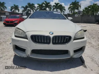 2014 BMW M6 with VIN WBS6C9C55ED467226, listed as a Copart auction lot 61779015 with Not provided miles and Salvage title. Bid and sale history available at DreamBid. Image 5.