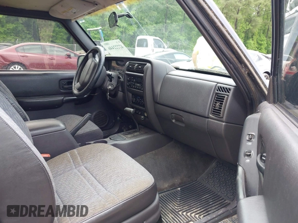 2001 Jeep Cherokee with VIN 1J4FT47S11L609530, listed as a IAAI auction lot 42222446 with 156,408 mi miles and . Bid and sale history available at DreamBid. Image 5.