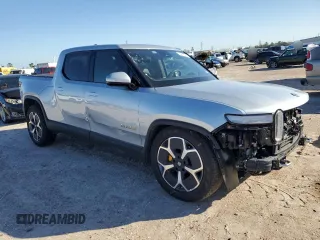 2023 Rivian R1T Adventure with VIN 7FCTGAAA3PN020577, listed as a Copart auction lot 84847414 with 7,888 mi miles and Salvage Title. Bid and sale history available at carsss.com. Image 4.