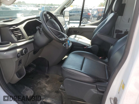 2023 Ford Transit Cargo with VIN 1FTBR1C86PKA12559, listed as a Copart auction lot 60771385 with 11,478 mi miles and Non repairable. Bid and sale history available at DreamBid. Image 7.