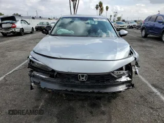 2025 Honda Civic Sedan LX with VIN 2HGFE2F28SH519958, listed as a Copart auction lot 77951444 with 8,157 mi miles and Salvage Title. Bid and sale history available at carsss.com. Image 5.