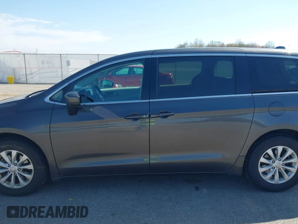 2017 Chrysler Pacifica Touring with VIN 2C4RC1DG0HR587782, listed as a IAAI auction lot 41954896 with 122,130 mi miles and . Bid and sale history available at DreamBid. Image 14.