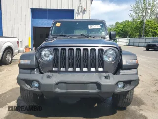 2020 Jeep Wrangler Unlimited Black and Tan with VIN 1C4HJXDGXLW221705, listed as a Copart auction lot 56224785 with 82,360 mi miles and Salvage title. Bid and sale history available at DreamBid. Image 5.