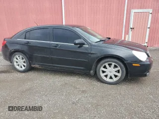 2009 Chrysler Sebring Touring z VIN 1C3LC56D69N570746, wystawiony jako Copart lot #55300405 z przebiegiem 186 391 mil mil oraz Czysty tytuł • Clean title. Historia ofert i sprzedaży dostępna na DreamBid. Obrazek 4.