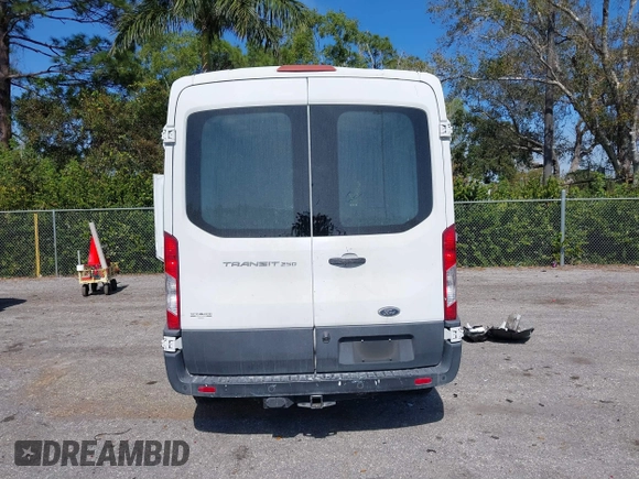 2015 Ford Transit Cargo with VIN 1FTNR1CM2FKB24963, listed as a IAAI auction lot 41455934 with 220,106 mi miles. Bid and sale history available at carsss.com. Image 16.
