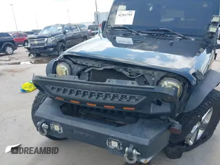2008 Jeep Wrangler Unlimited Sahara with VIN 1J4GB59198L619802, listed as a IAAI auction lot 42361793 with 272,295 mi miles and . Bid and sale history available at DreamBid. Image 19.