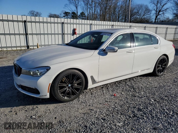 2017 BMW 7 Series 740i with VIN WBA7E2C32HG740649, listed as a Copart auction lot 45593145 with 122,793 mi miles and Salvage Title. Bid and sale history available at carsss.com. Image 1.